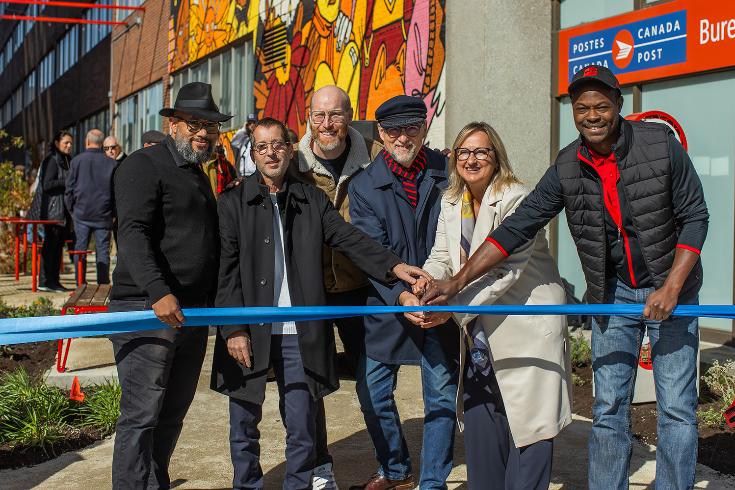 PHOTO BY ÉMILIE DELORME, FOR SDC DISTRICT CENTRAL
The inauguration of L’Oasis Alley in October 2025 highlights a key achievement of the Signature Intervention Plan, which promotes the creation of accessible spaces and collaboration between public and private partners across District Central. From left to right: Gabriel Tupula (SDC District Central), Howard Szalavetz (Les Immeubles HS), Marc André Carignan (SDC District Central), André A. Morin (Member of the National Assembly for Acadie), Hélène Veilleux (SDC District Central) and Ronel Allagbe (Innotex).